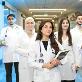 young medical students in university hallway